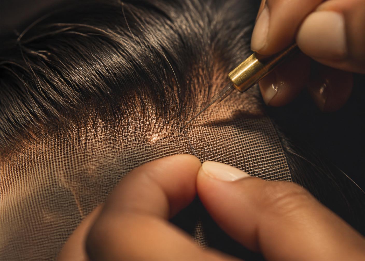 Hand ventilating a lace wig